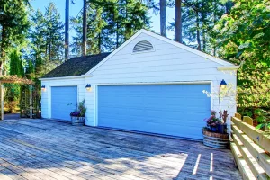 Carriage house with blue doors