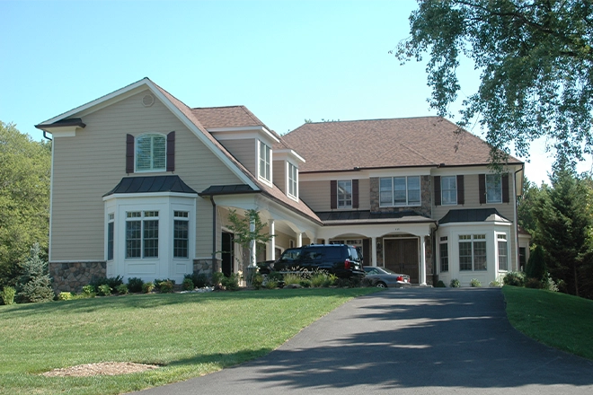 How much does it cost to build a home with multiple levels and garages and architectural details