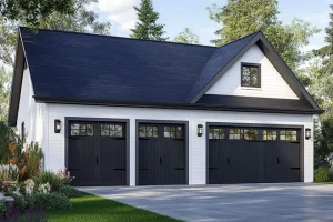 Detached garage with 3 doors and upper floor